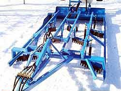 Undated Bow Pioneers Snowmobile Club photo of a mogul master snow groomer